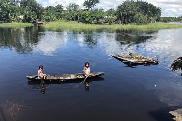 Amazon Dream's 6-Day Tapajos Cruise Itinerary Day Five - Natives canoeing.