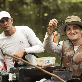 Two man fishing the piranas