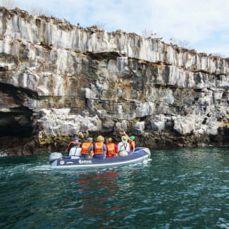 Group of people in the skiff on an excursion