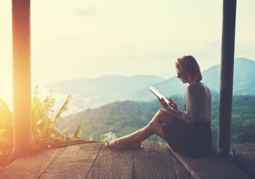 Female,Is,Typing,Something,In,Diary,On,Touch,Pad,,While